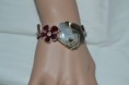 Bracelet rose en nacre fleurs en émail pourpre et saumon 2 cm.